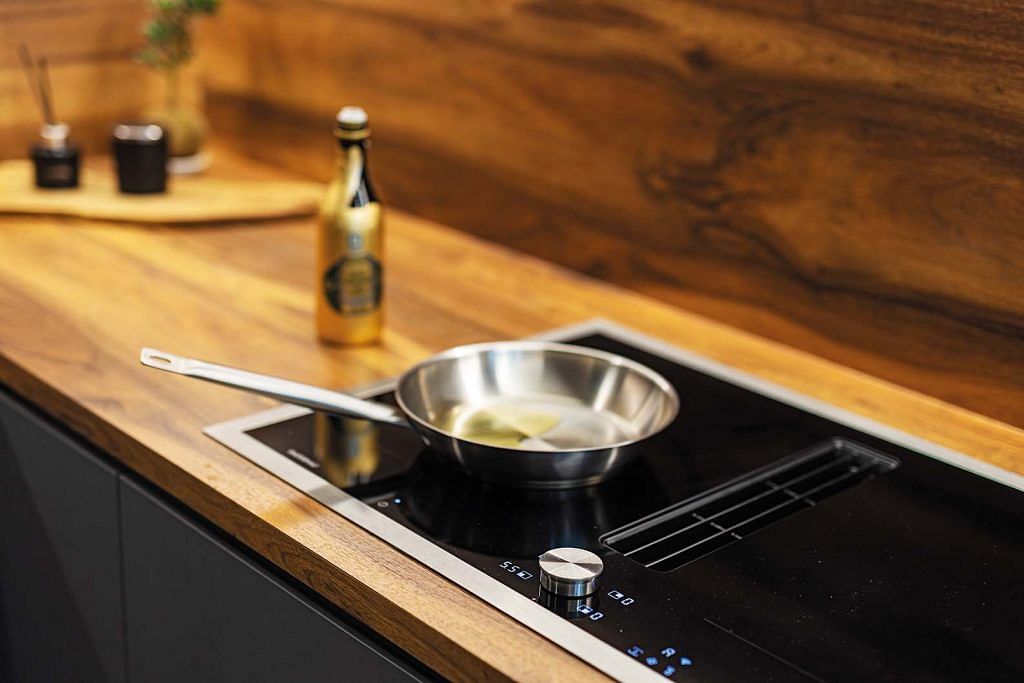The Gaggenau’s CV282 induction cooktop has an integrated ventilator in the centre.