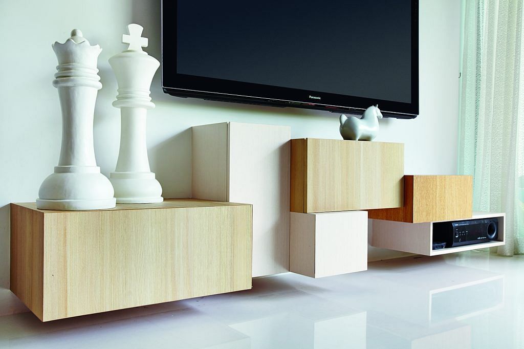 This striking design that houses audiovisual equipment is an unconventional alternative to a standard TV console. Giant chess pieces from Egg3.