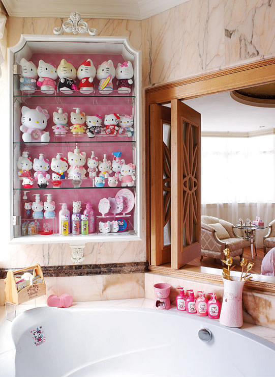 Hello Kitty bath products like liquid soap dispensers are all on show in the master bathroom.