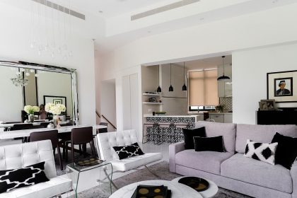 A chic black-and-white D’Leedon home living room with a $30,000 renovation price tag