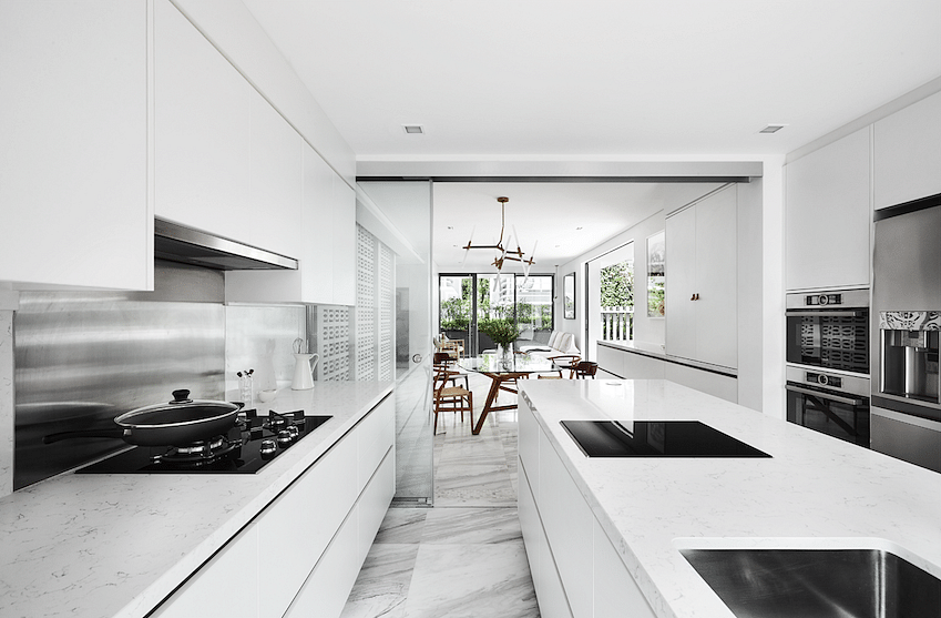 Monochrome galley style kitchen with Technistone quartz kitchen countertop