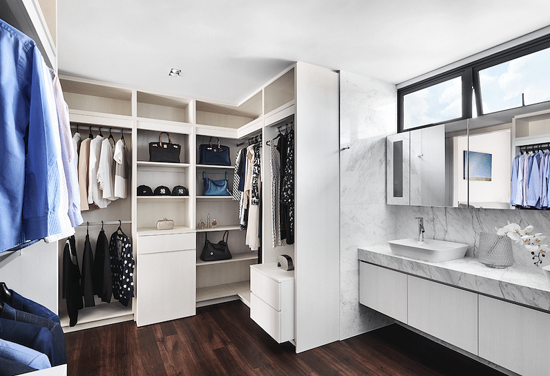 A white and wood walk-in wardrobe
