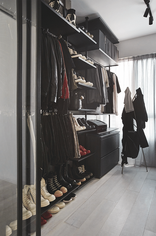 The stylish couple, Evon Chng and Joseph Ho, own expansive collections of clothes and shoes. They are showcased in the walk-in wardrobe, which was converted from a bedroom.