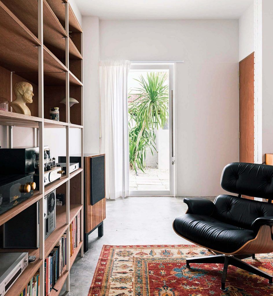 An Eames Lounge Chair and Ottoman is a nod to the home’s architectural inspiration.