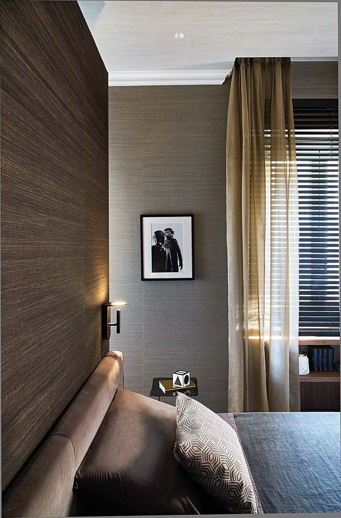 Walls cladded in textured wallpaper makes the bedroom feel cosier and more intimate.