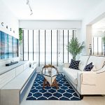 Blue, white, and bright, this four-room HDB BTO flat in Geylang houses a unique blend of Venice and Santorini design elements.