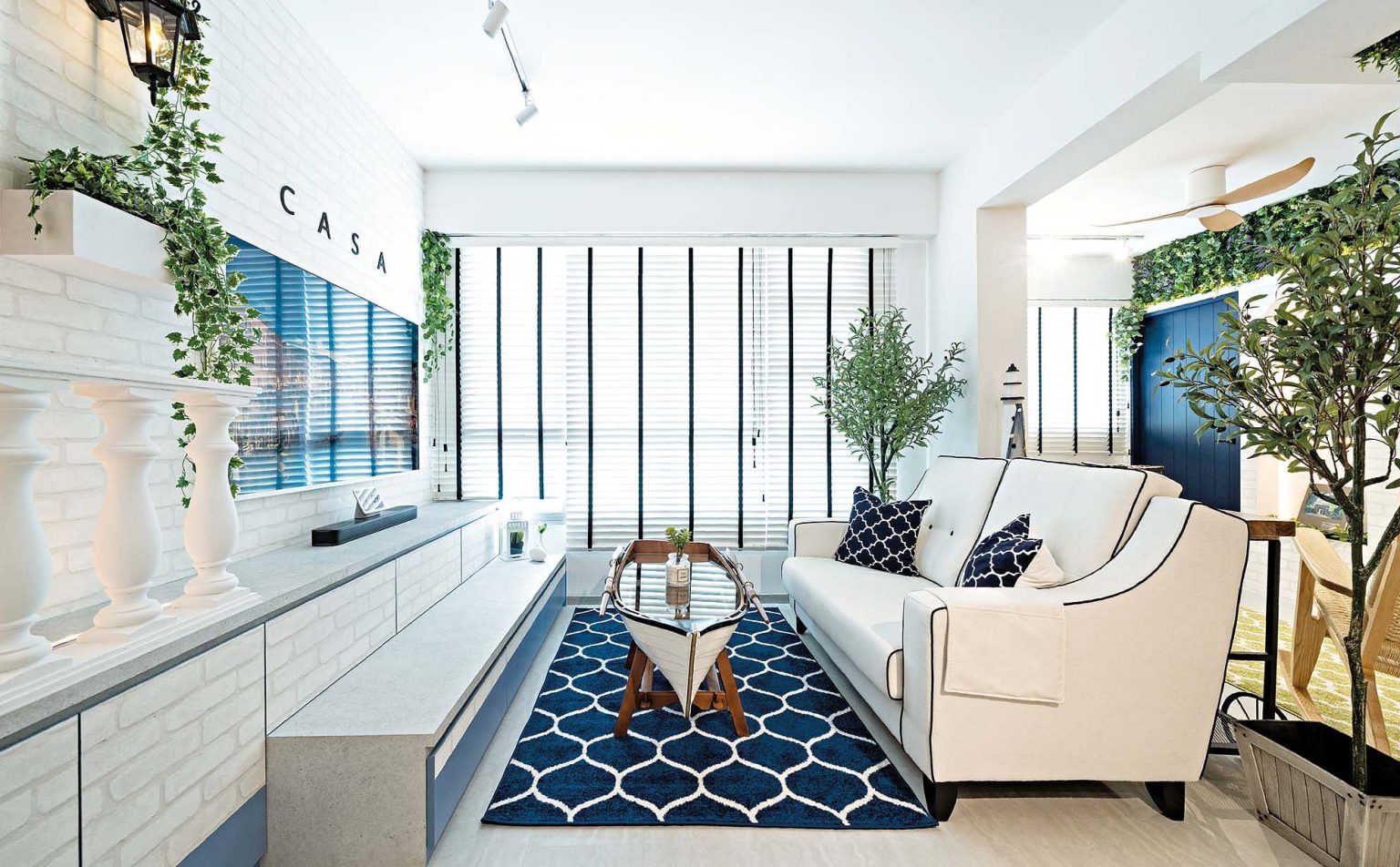 Blue, white, and bright, this four-room HDB BTO flat in Geylang houses a unique blend of Venice and Santorini design elements.