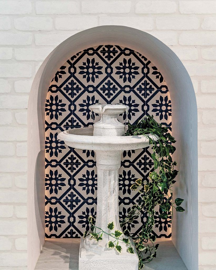 A water fountain for Feng Shui was an element broached midway, so Carmen revised the courtyard design to make the water fountain the star of the space.