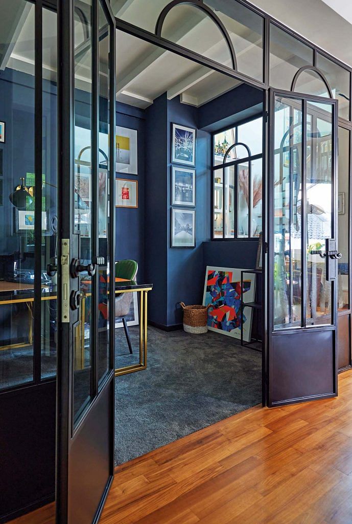 The study room enclosure continues the Crittall-style theme, but with a little twist at the top