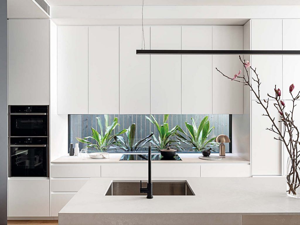 The kitchen’s north-facing window allows for maximum natural light.
