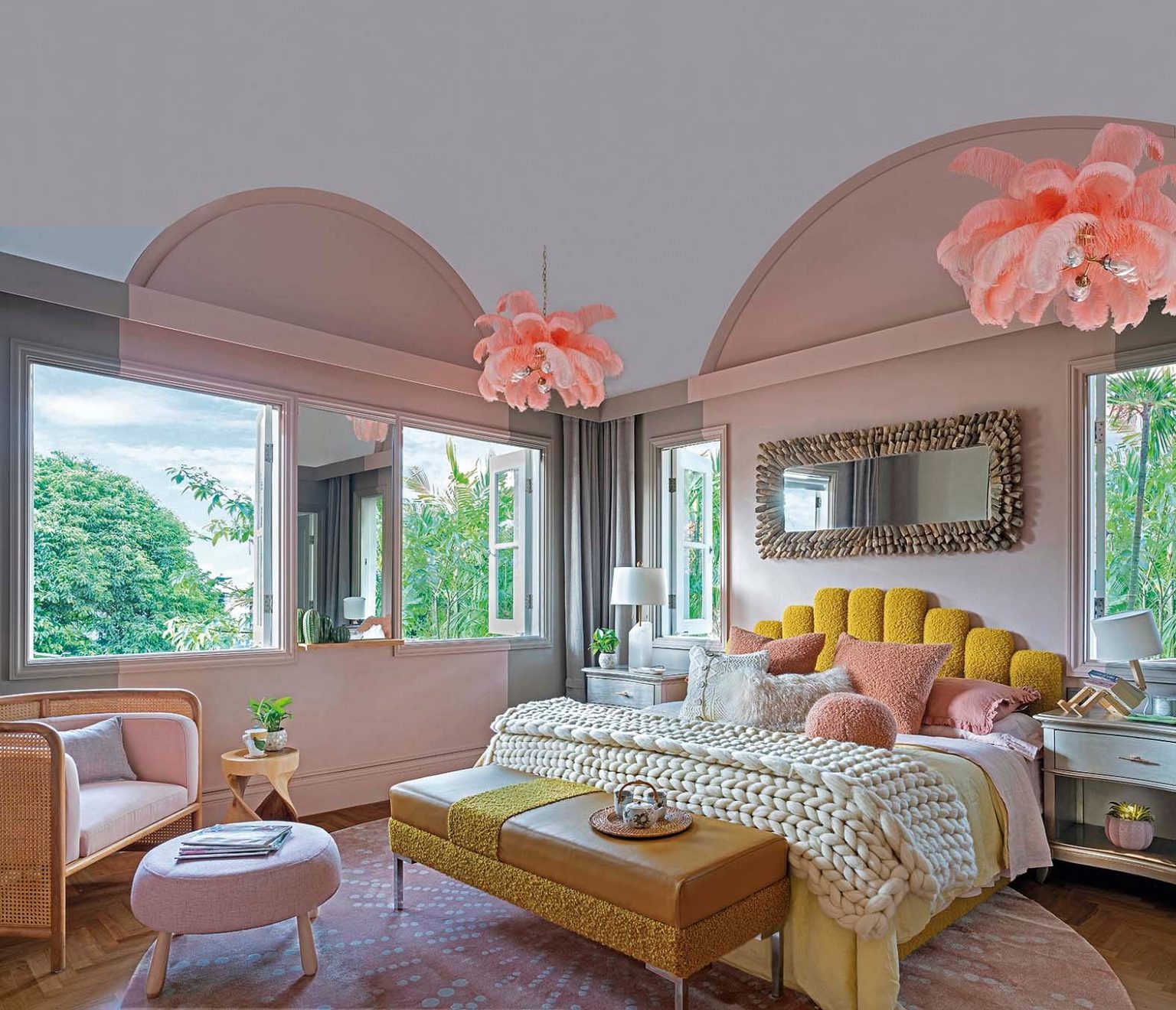 The contrasting shades of pink, grey and mustard in this bedroom, designed by Nikki Hunt of Design Intervention, help to make the space cosy and warm.