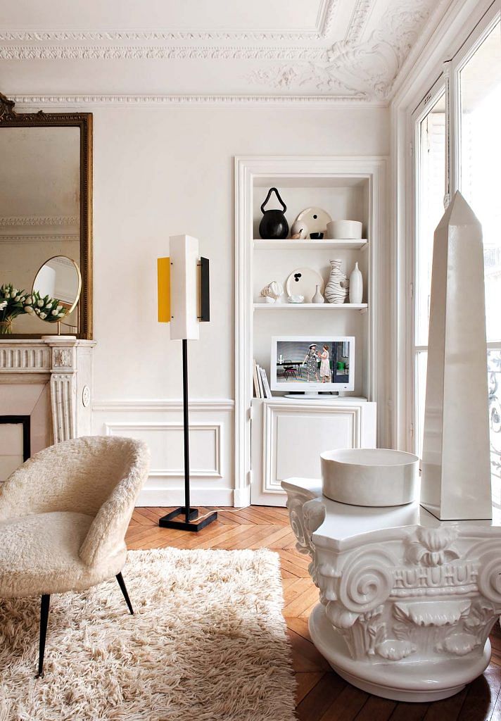 The mostly white interiors create the perfect canvas for showcasing the French interior designer Emilie Bonaventure’s eclectic style.