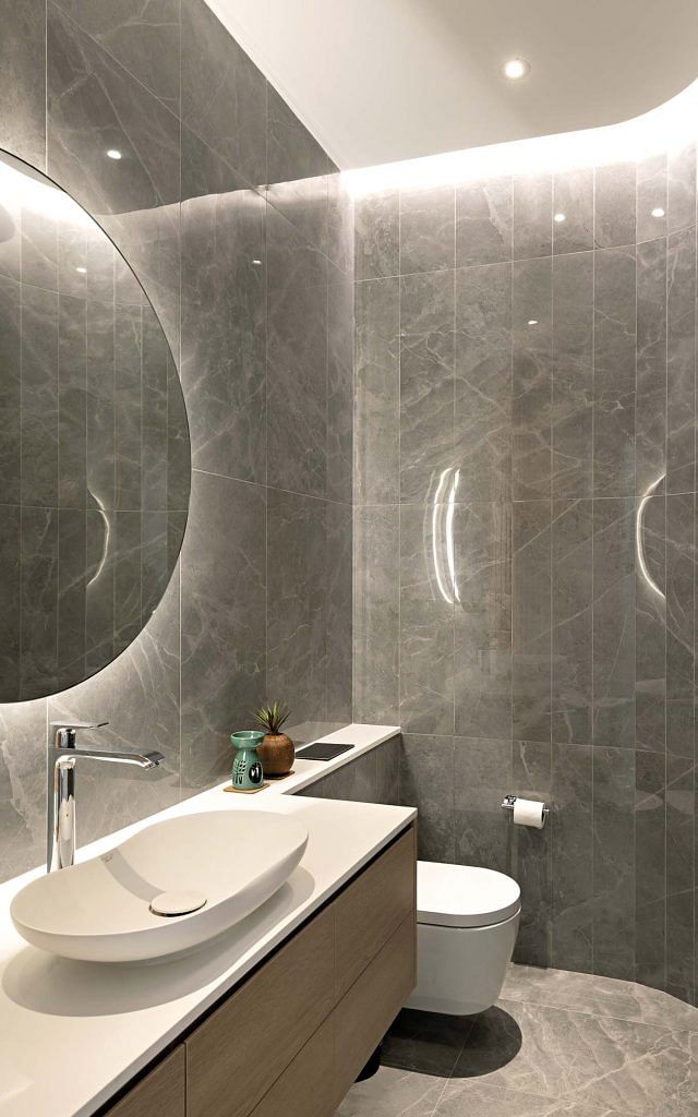 Taking cues from the “ren” roof, curves are introduced around the house, such as in the powder room, to soften the forms.