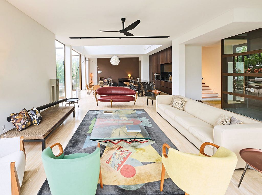 The living room resembles a furniture gallery showcasing pieces from Sharne and his father’s collection, including an Omnia by Maxalto sofa and Alanda by Paolo Piva coffee table from B&B Italia.