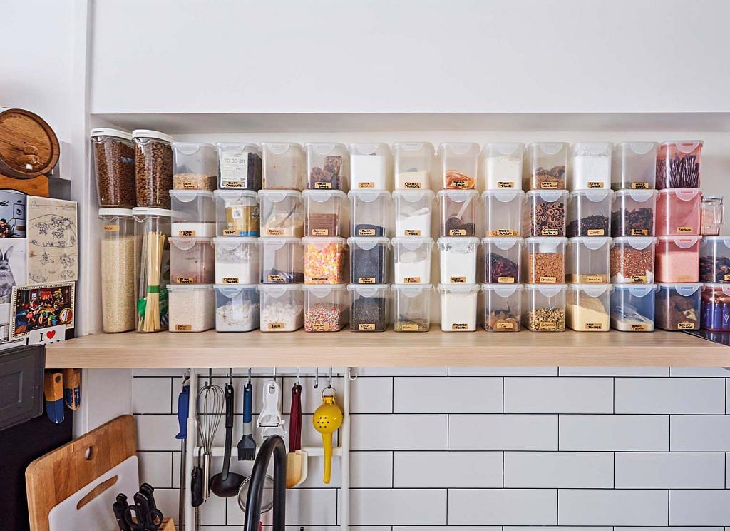 Chef Quek keeps his dry ingredients on the shelf just above the kitchen sink.