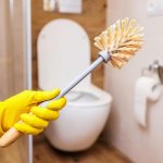 yellow rubber glove in the bathroom