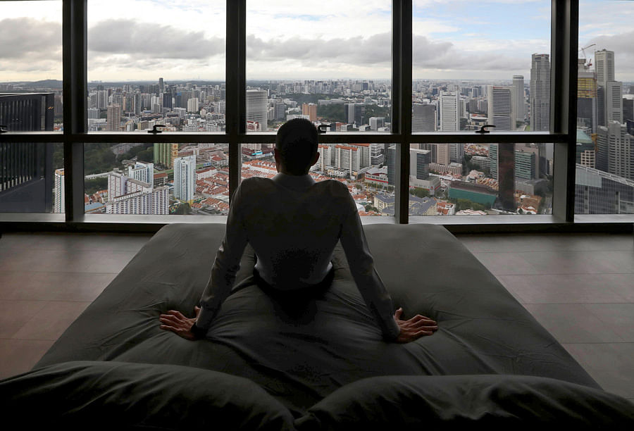 A bachelor eye doctor’s 50th floor monochrome condo in Wallich Residences, Raffles Place. Photo: Strait Times