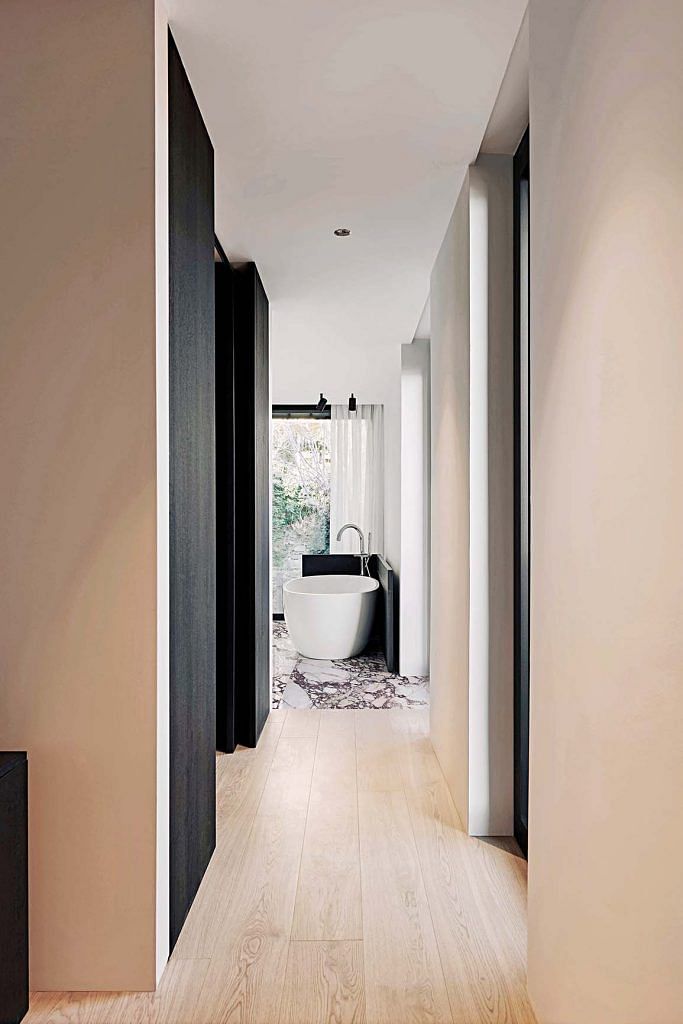 View of a oval bathroom from the corridor