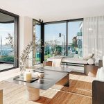 An apartment with seamless floor to ceiling windows
