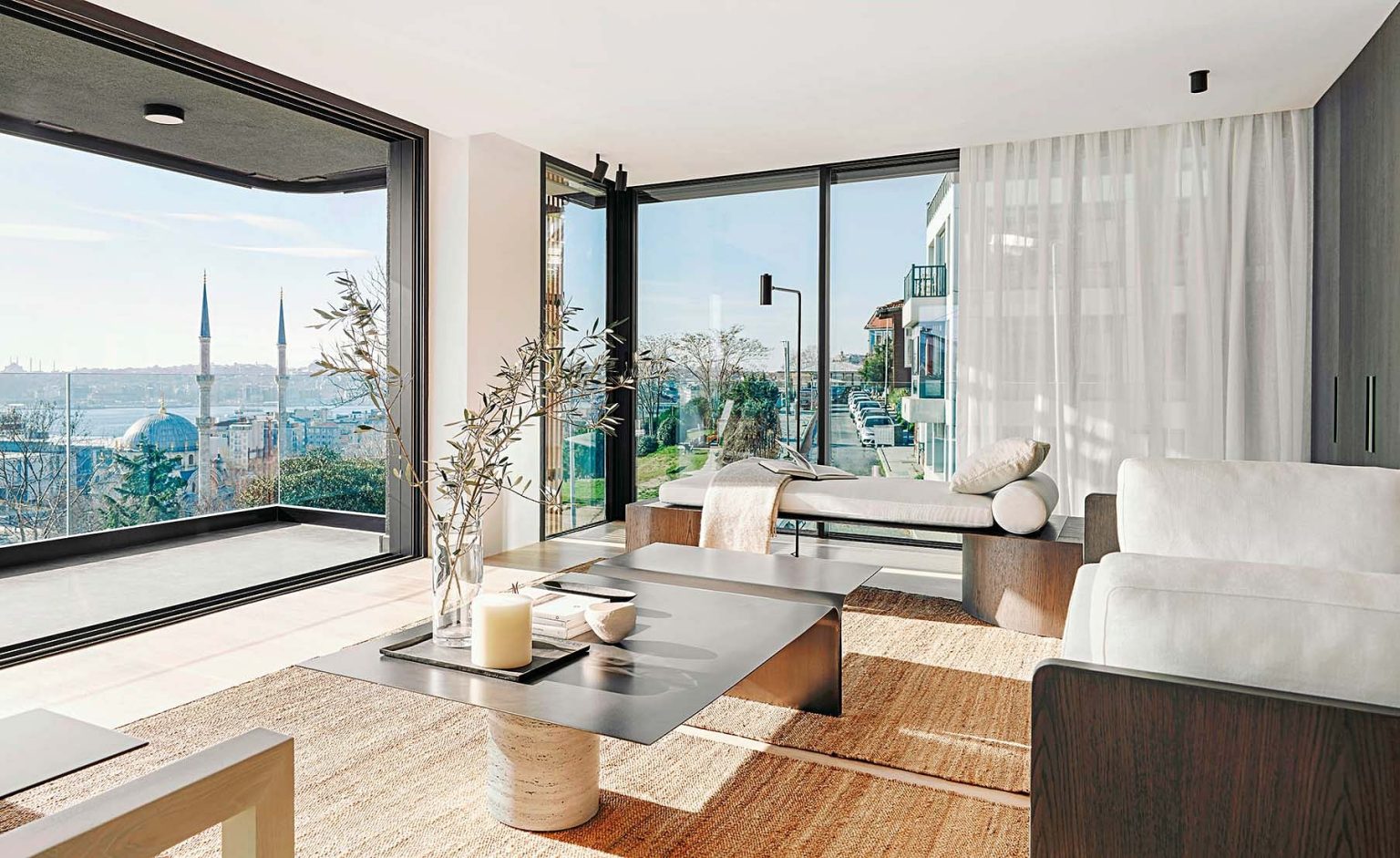 An apartment with seamless floor to ceiling windows