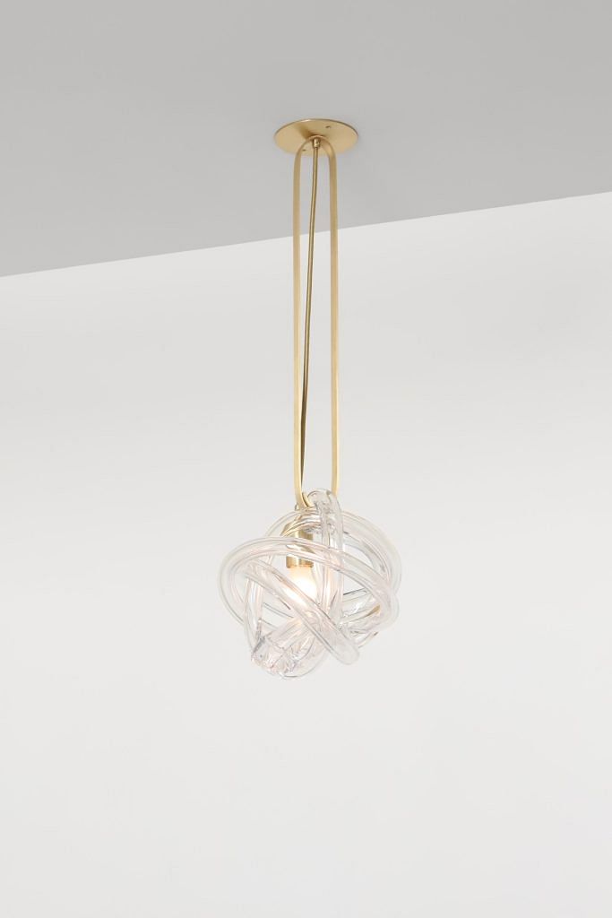 SkLO Wrap Pendant Lamp ($3,699) in white glass, brushed brass, and gold cord
