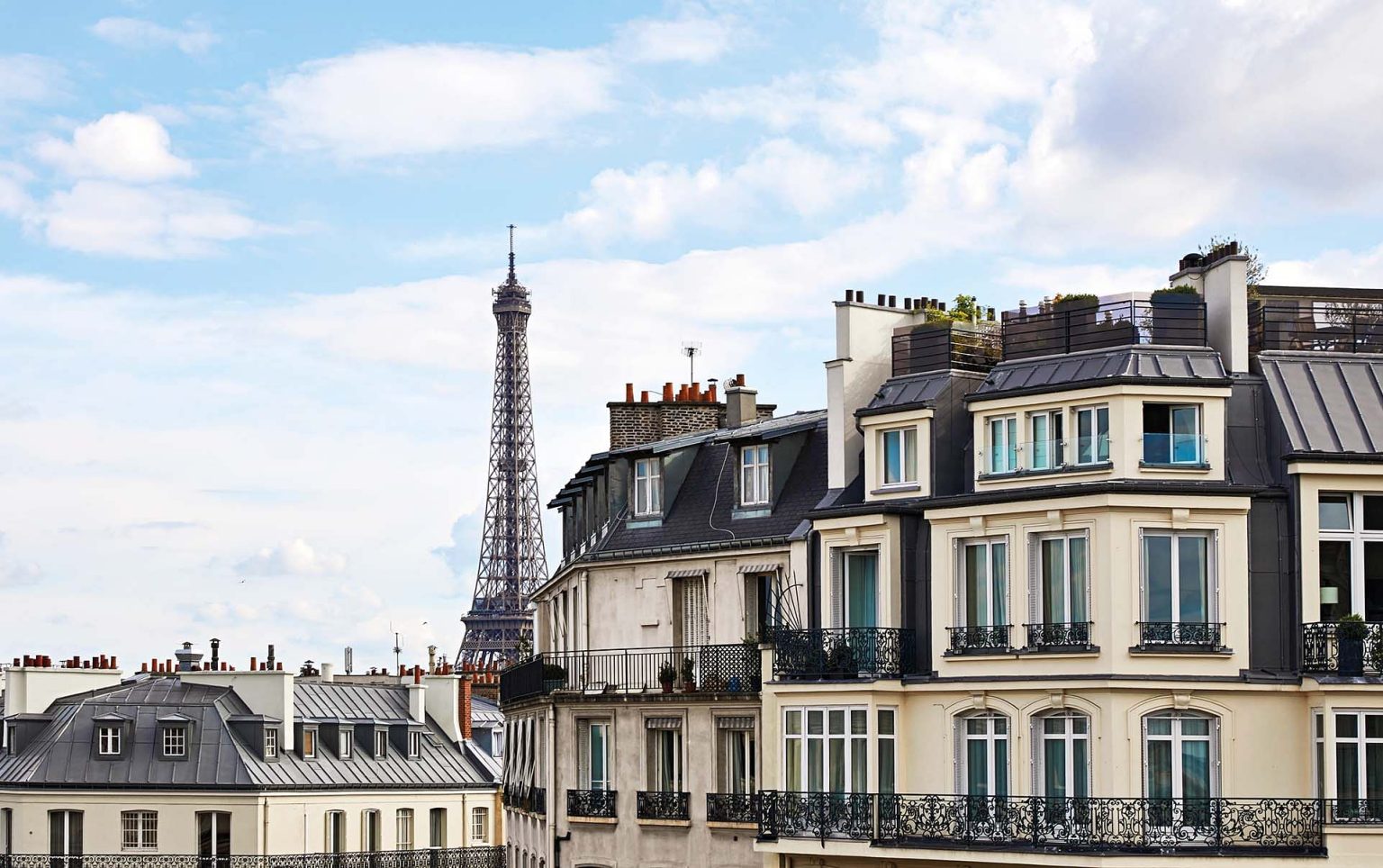 House Tour: A Luxurious, Simple All-White Apartment facing Eiffel Tower in Paris