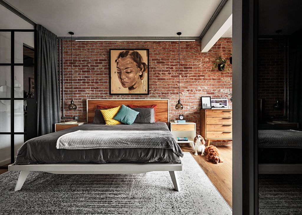 The black- framed doorways add a graphic touch that echoes the black-framed doors to the bedroom.