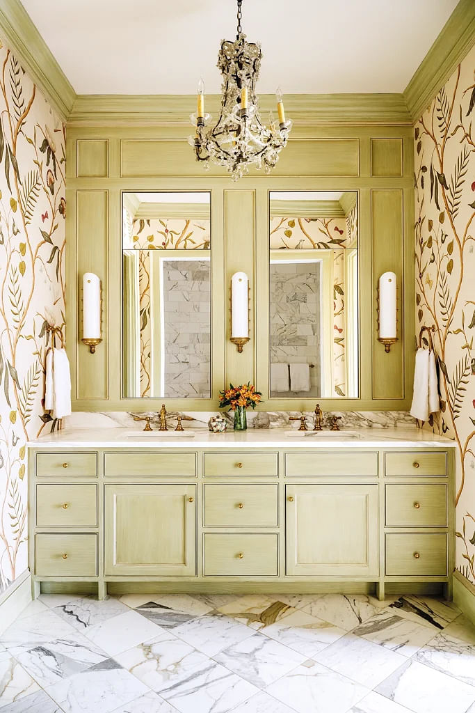 Wall covering by Lewis & Wood. Custom painted millwork by Kristen Bunting. Wall lighting by Urban Archeology. Faucets and fittings by Waterworks.
