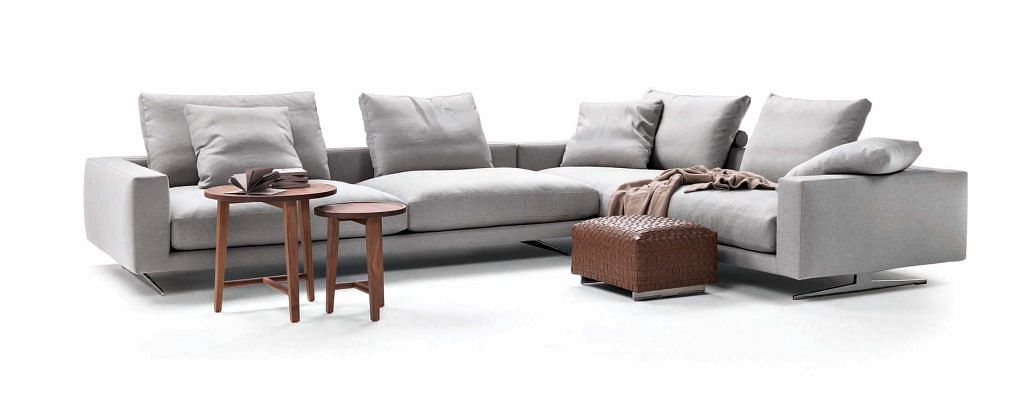 Flexform Campiello sofa by Antonio Citterio (2018) sits on an elegantly cast aluminium base painted gray or bronze, or with satin, chromed, burnished, black chrome, or champagne finishes.