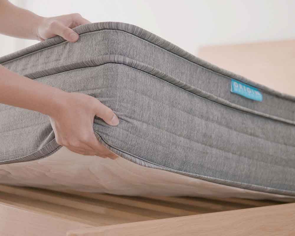 The Origin Hybrid Mattress is a 10-inch hybrid of natural latex, cooling gel, memory foam, and pocket springs for breathable temperature regulation in Singapore’s tropical hot climate.