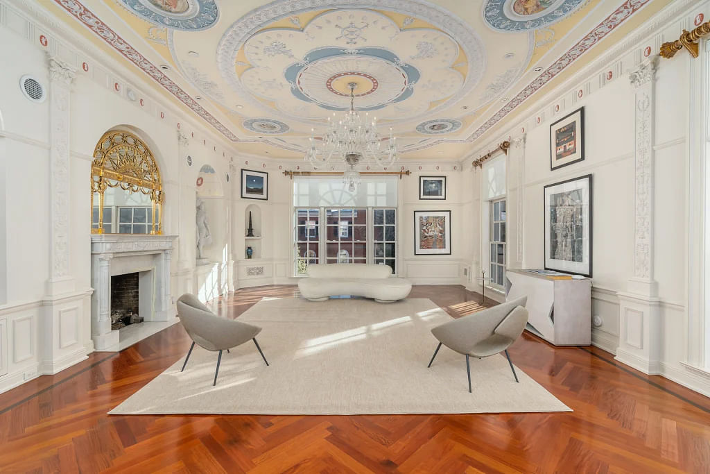 An additional home boasts this grand ceiling mural.