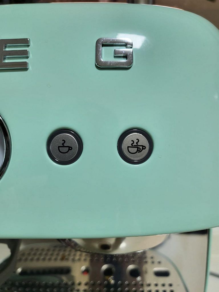 SMEG espresso coffee machine with grinder EGF03 comes with 2 buttons - one for single shot, another for double shot
