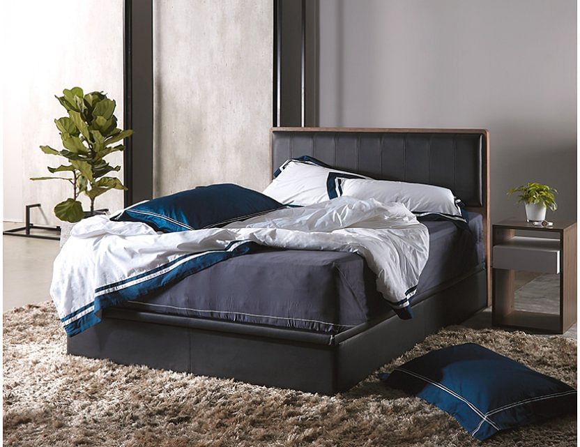 Black leather bed frame with storage