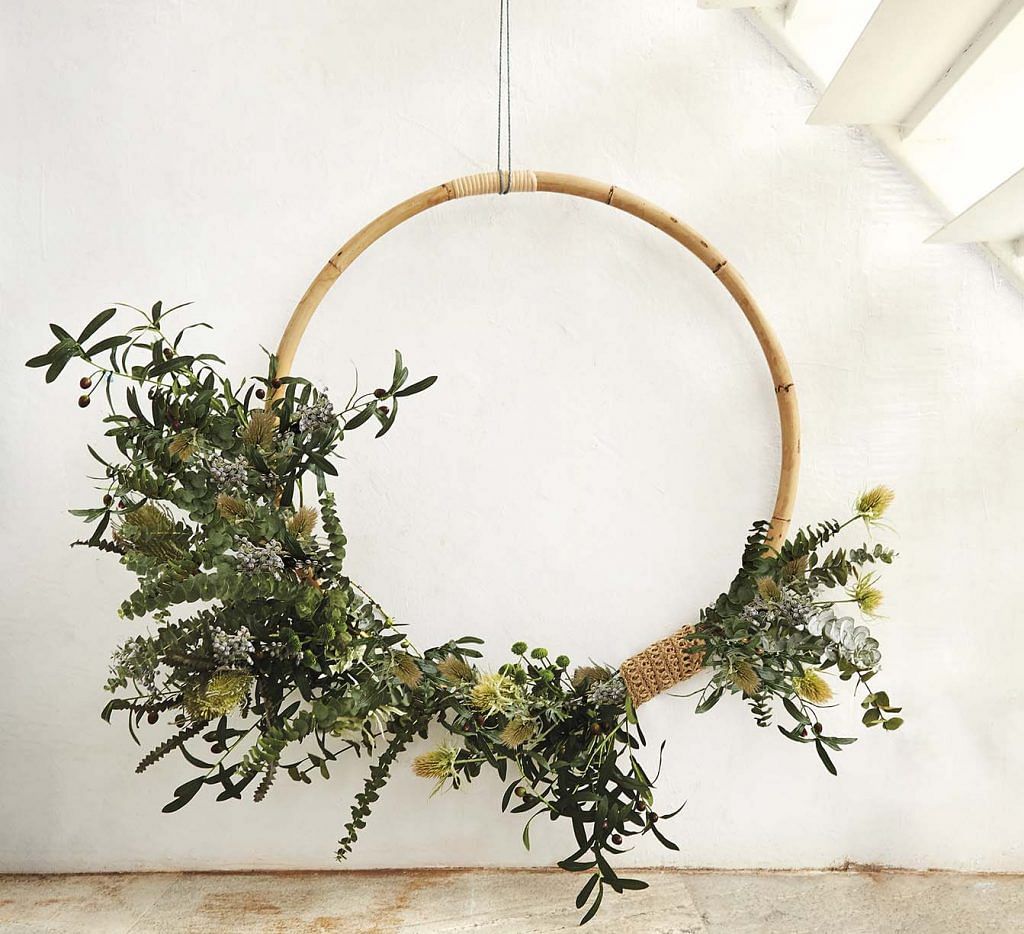A simple rattan ring can be used for floral arrangements during Christmas (and subsequently Chinese New Year).